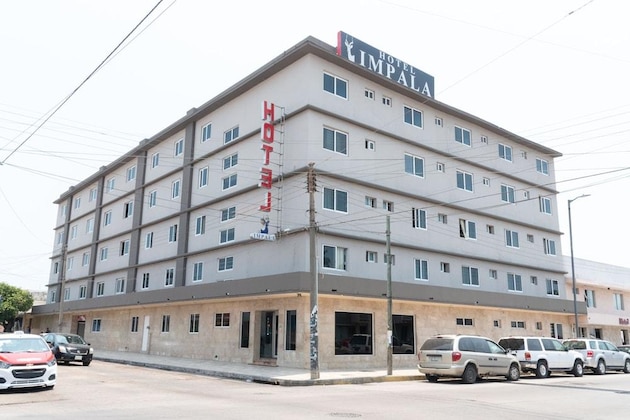 Gallery - Impala Hotel In Front Of The Ado