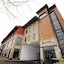 Carrick Plaza Suites & Apartments