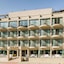 Olivia Palm Hotel